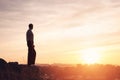 Silhouette of a man at the sunset on the mountain Royalty Free Stock Photo