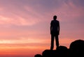 Silhouette of a man at the sunset on the mountain Royalty Free Stock Photo