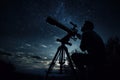 Silhouette of a man with a telescope in nature at night