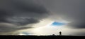 Silhouette of man watching huge storm and clouds in Iceland