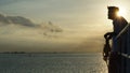 Silhouette of Man Watching the Ocean on Deck of Passenger Ship Royalty Free Stock Photo