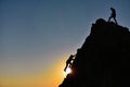 Silhouette of the man who climbed the rocks