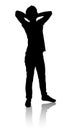 Silhouette of a man who stands and relaxes