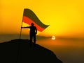 Silhouette man winner waving germany flag on top of the mountain peak Royalty Free Stock Photo