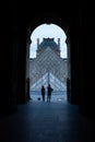 Silhouette at the Louvre pyramid