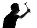 Silhouette of a man working with hammer Royalty Free Stock Photo