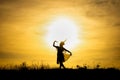 Silhouette Manohra women dance with sunset in South of Thailand Royalty Free Stock Photo