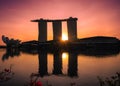 Silhouette of the Marina Bay Sands hotel against the bright golden sunset Royalty Free Stock Photo