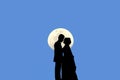 Silhouette of married couple kissing There is a moon and the bl