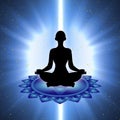 Silhouette of meditating person with throat chakra symbol background