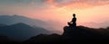 The silhouette of a meditator enjoying a serene sunset in the mountains..AI generated image Royalty Free Stock Photo