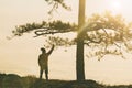 Silhouette of men show arm up for achievements successful and ce