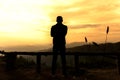 Silhouette Men standing back on the view point in the evening. Royalty Free Stock Photo