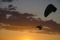 Silhouette of an microlight flying Royalty Free Stock Photo