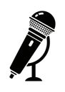 Silhouette of a microphone with a globe stand design. The Royalty Free Stock Photo