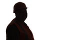 Silhouette of middle-aged builder contractor in hard hat looking in camera on white isolated background, building industry concept Royalty Free Stock Photo