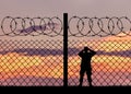 Silhouette of a military border guard Royalty Free Stock Photo
