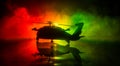 Silhouette of military helicopter ready to fly from conflict zone. Decorated night footage with helicopter starting in desert with Royalty Free Stock Photo