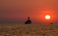 Silhouette military war ship and the sun Royalty Free Stock Photo