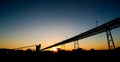 Silhouette of a mining silo and conveyor belts