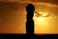 Silhouette of a Moai statue of Ahu Ko Te Riku against sunset sky over the Pacific ocean, Easter Island, Chile