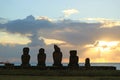 Silhouette of the Moais at Ahu Tahai Ceremonial Platform against Sunset over Pacific Ocean, Easter Island