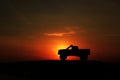 Probolinggo indonesia. July 6, 2016. Silhouette of sunrise toy cars on the beach Royalty Free Stock Photo