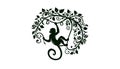 Silhouette of a monkey hanging from a stylized tree branch, ad Royalty Free Stock Photo