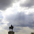 Silhouette of the monument of Ataturk in Ankara and sunrays in the clouds