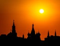 Silhouette of the Moscow Kremlin and St. Basil`s Cathedral against the background of the setting sun. Moscow, Russia-June 2019 Royalty Free Stock Photo
