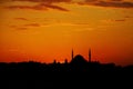 Silhouette of a mosque minaret at sunset Royalty Free Stock Photo