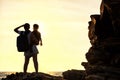 Silhouette of mother and son boy see sunaet at beach Royalty Free Stock Photo