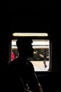 Silhouette motion of local train passenger