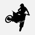 silhouette of a motocross racer doing a stunt, jumping. graphic vector illustration. Royalty Free Stock Photo