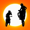 Silhouette of motocross rider jump in the sky