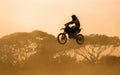 Silhouette of motocross rider jumping Royalty Free Stock Photo