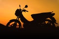 A silhouette of a motorcycle from a side view Royalty Free Stock Photo
