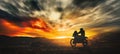 Silhouette of a motorcyclist tackling the Dakar rally at sunset