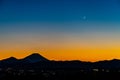 Silhouette of Mount Fuji and the crescent