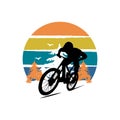 Silhouette mountain biker design with tree background Royalty Free Stock Photo