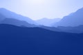 Silhouette of Mountain Range Layered in Blue Royalty Free Stock Photo