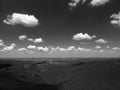 Silhouette of mountains in Bulgaria in summer early morning and many white clouds in the blue sky. Mountainous view. Royalty Free Stock Photo