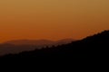 Silhouette mountains in Valle del Ambroz at sunset in autumn horizontal