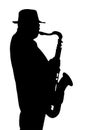 Silhouette of the musician playing on a saxophone.
