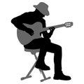 Silhouette musician plays the guitar on a white background Royalty Free Stock Photo