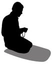 Silhouette of a Muslim Praying Royalty Free Stock Photo