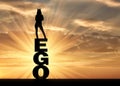 Silhouette of a narcissistic and selfish woman with a crown on her head standing on the word ego Royalty Free Stock Photo