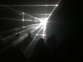 Silhouette in night club under light rays beam Royalty Free Stock Photo
