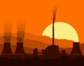 Silhouette of a nuclear power plant at sunset.