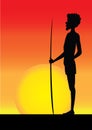 Silhouette of aborigine man in the sunset